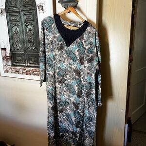 Vintage dress sized 3x. It would be a smaller 3x.